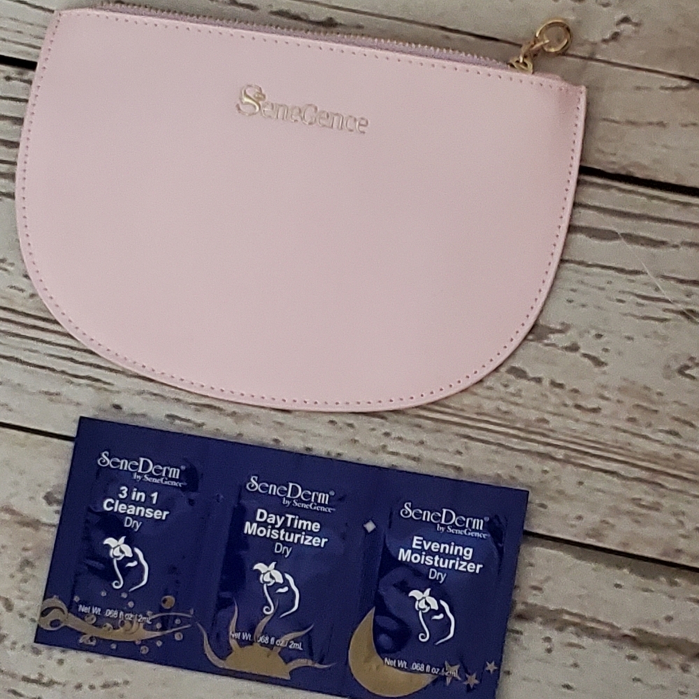 SeneGence pearlized pink vinyl makeup bag with skin care samples